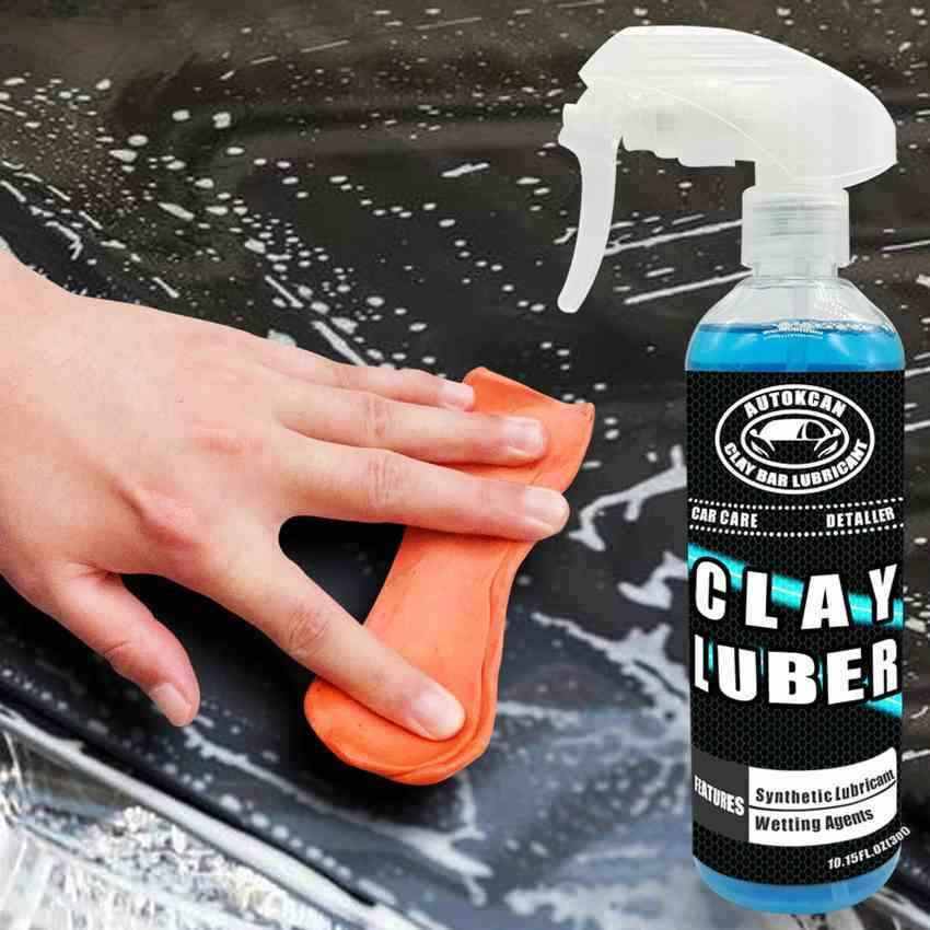 Clay bar treatment with lubricant for paint correction.