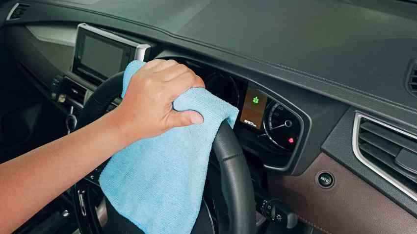 Express Standard Interior Detail package application on car dashboard.